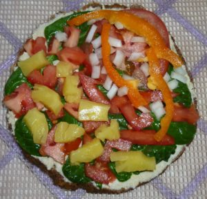 Raw vegan spinach veggie pizza