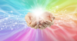 Reiki-Healing hands and rainbow energy field